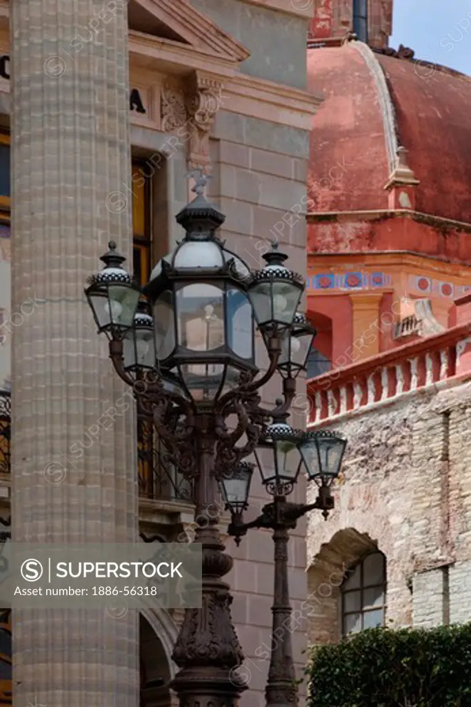 ROMAN COLUMNS and STREET LAMPS at THE TEATRO JUAREZ which is a historical THEATER - GUANAJUATO,  MEXICO