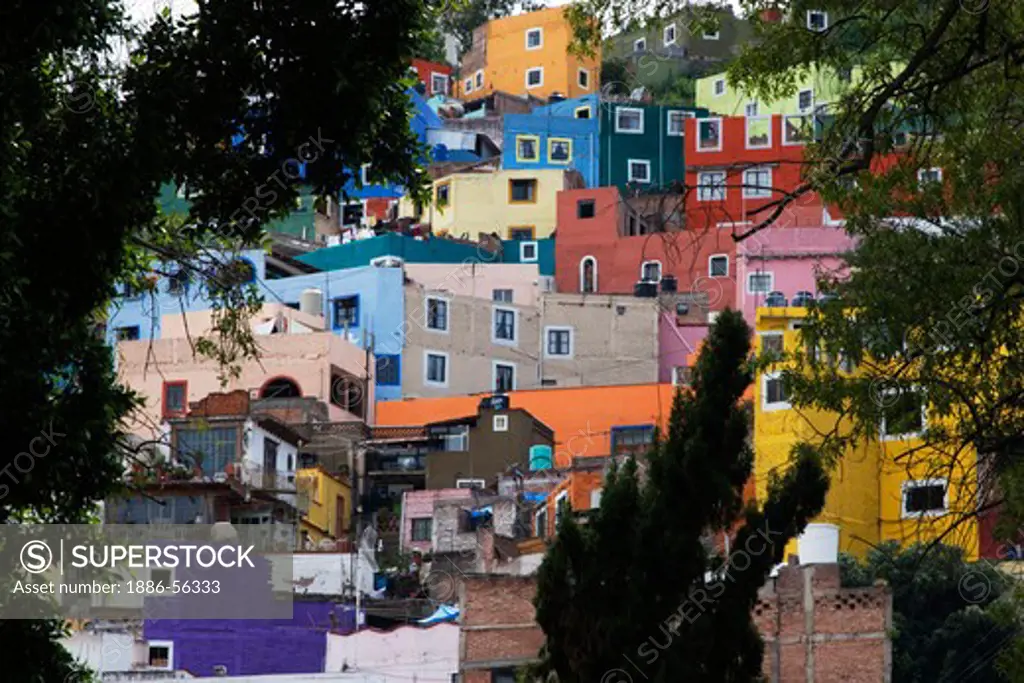 The HOUSES of the HISTORICAL town of GUANAJUATO are painted bright colors - MEXICO