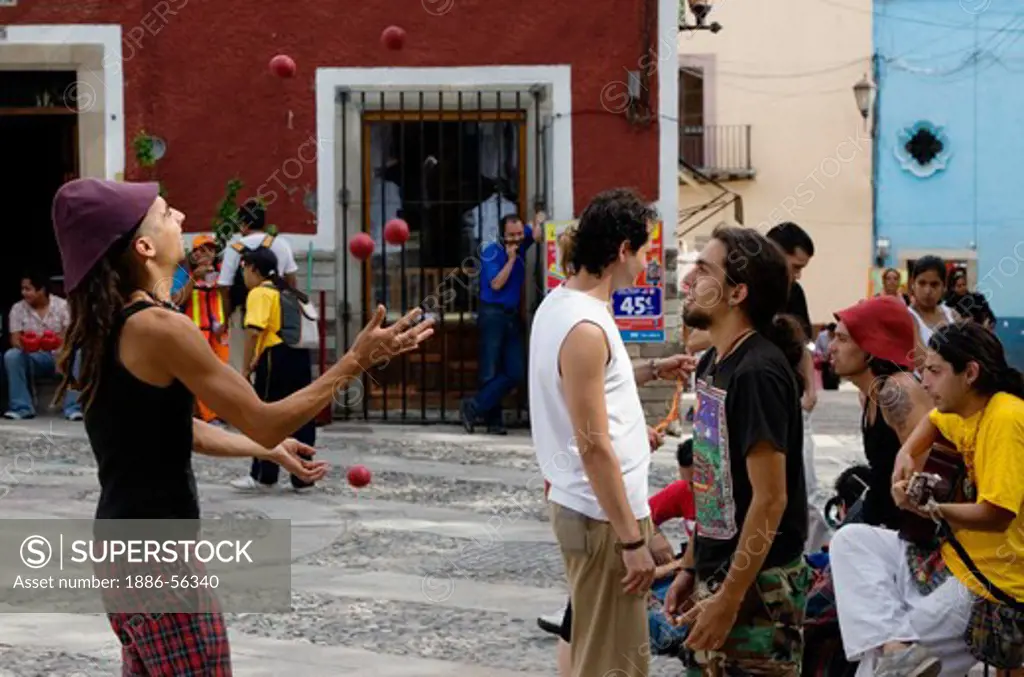 MEXICAN HIPPIES perform as JUGGLERS at the CERVANTINO FESTIVAL - GUANAJUATO, MEXICO