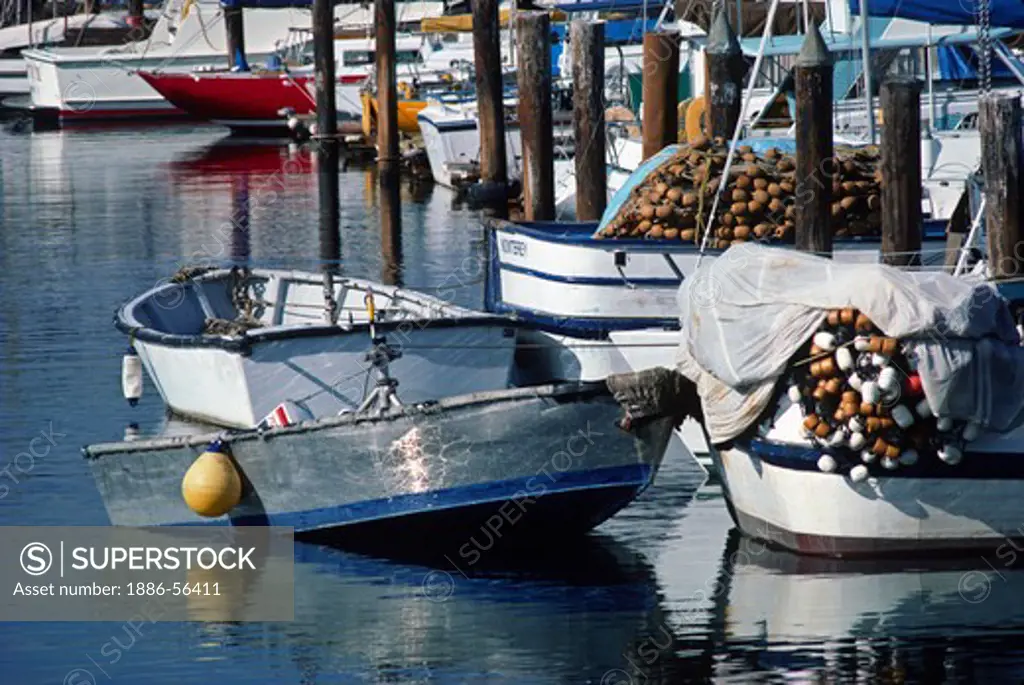 FISHING BOATS and nets in MONTEREY HARBOR - CALIFORNIA