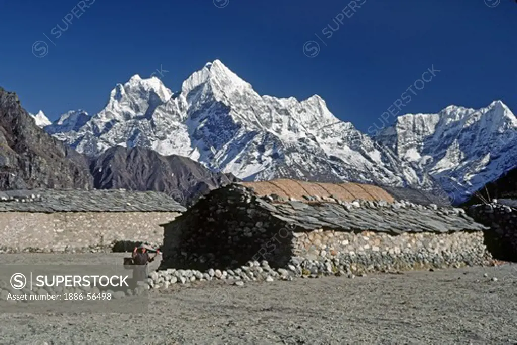 Sherpa house in the village of Thame with Kyajo Ri  (left) & Khumbila Peak (right) forming a Himalayan backdrop - KHUMBU DISTRICT, NEPAL