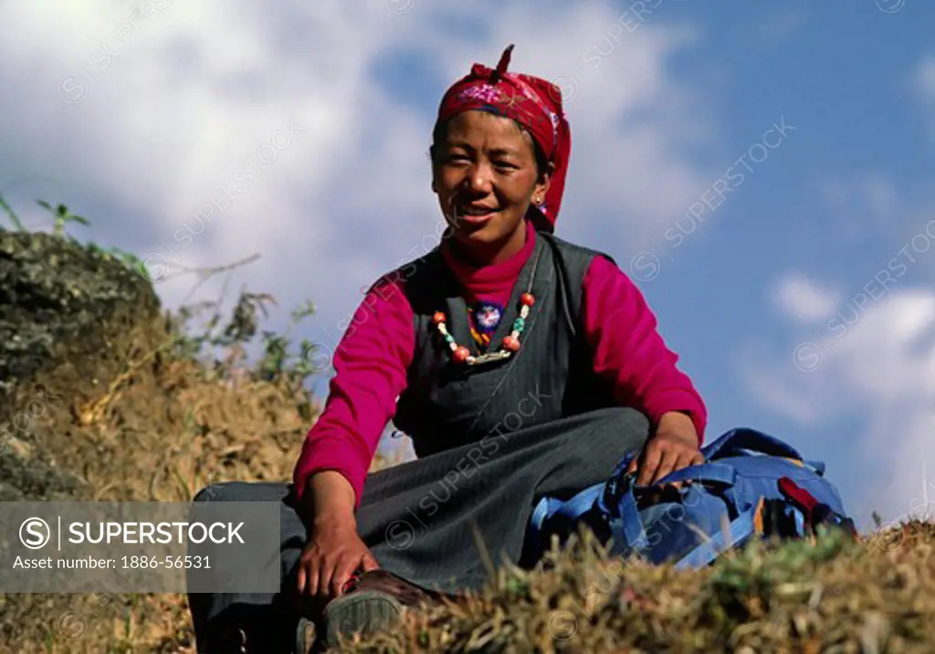 Sherpani woman in traditional dress - SIKLIS TREK, NEPAL