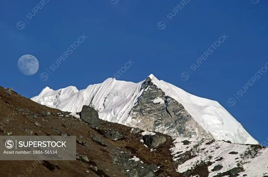 Island Peak & the full moon in the Everest Region - KHUMBU DISTRICT, NEPAL
