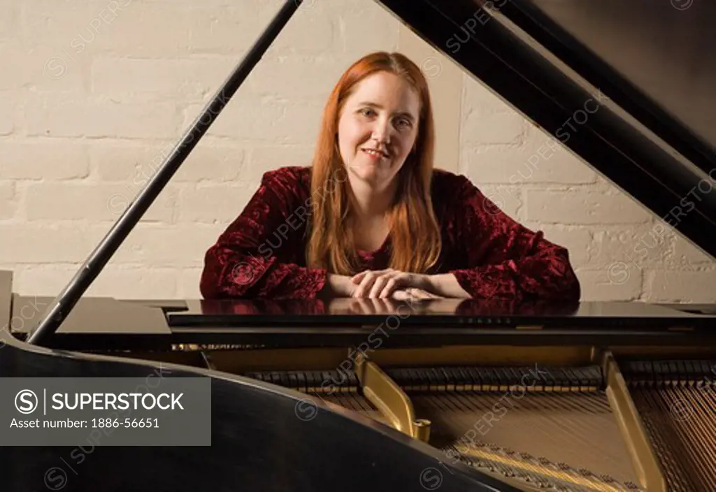 CONCERT PIANIST ANNA DAVIDSON with a BABY GRAND PIANO (MR)