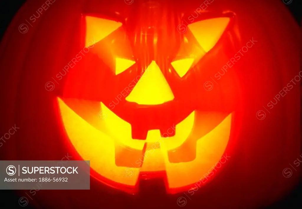 Halloween Jack-O-Lantern with blurred light effect.