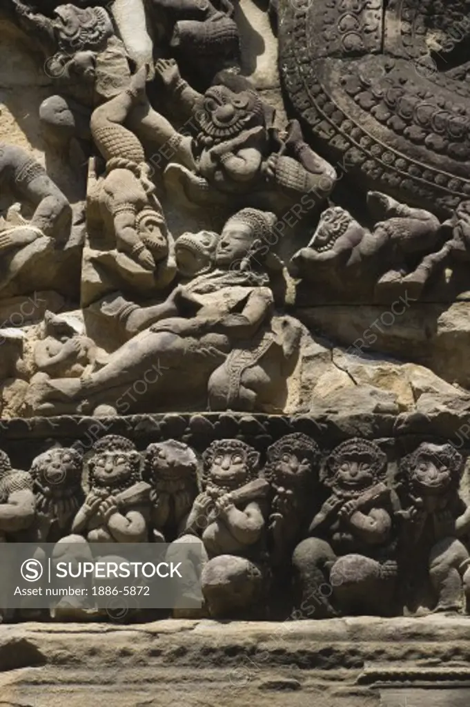 Bas relief of Hindu mythology with monkey army at  East Mebon, built of laterite and sandstone by Rajendravarman in the10th century - Angkor Wat, Siem Reap, Cambodia    