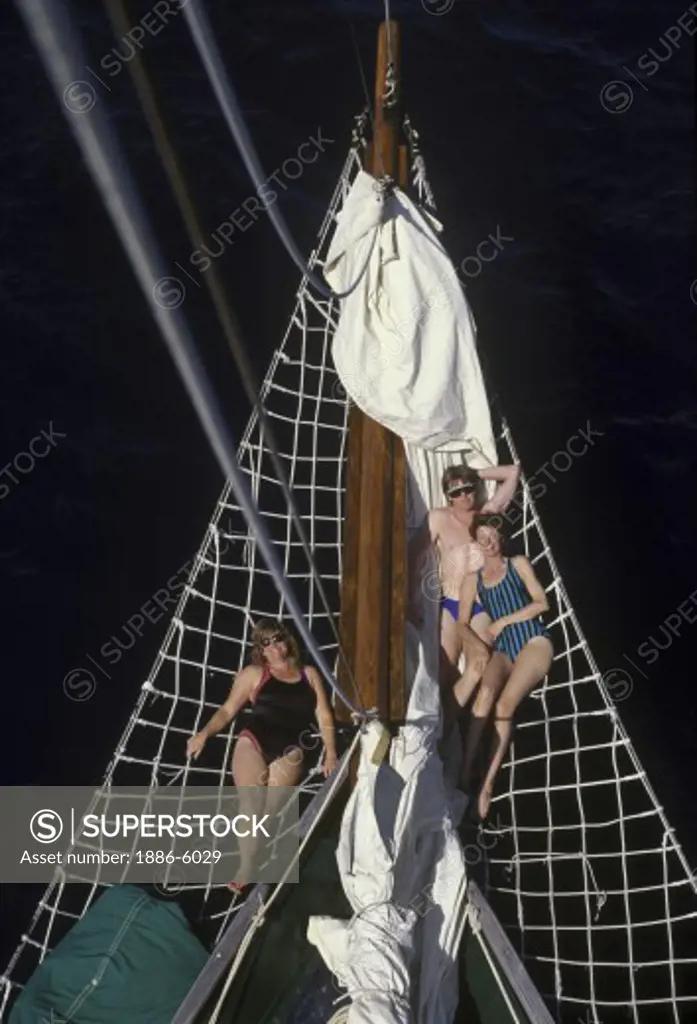 Sunbathing aboard LA VIOLANTE, a double masted French schooner - FIJI