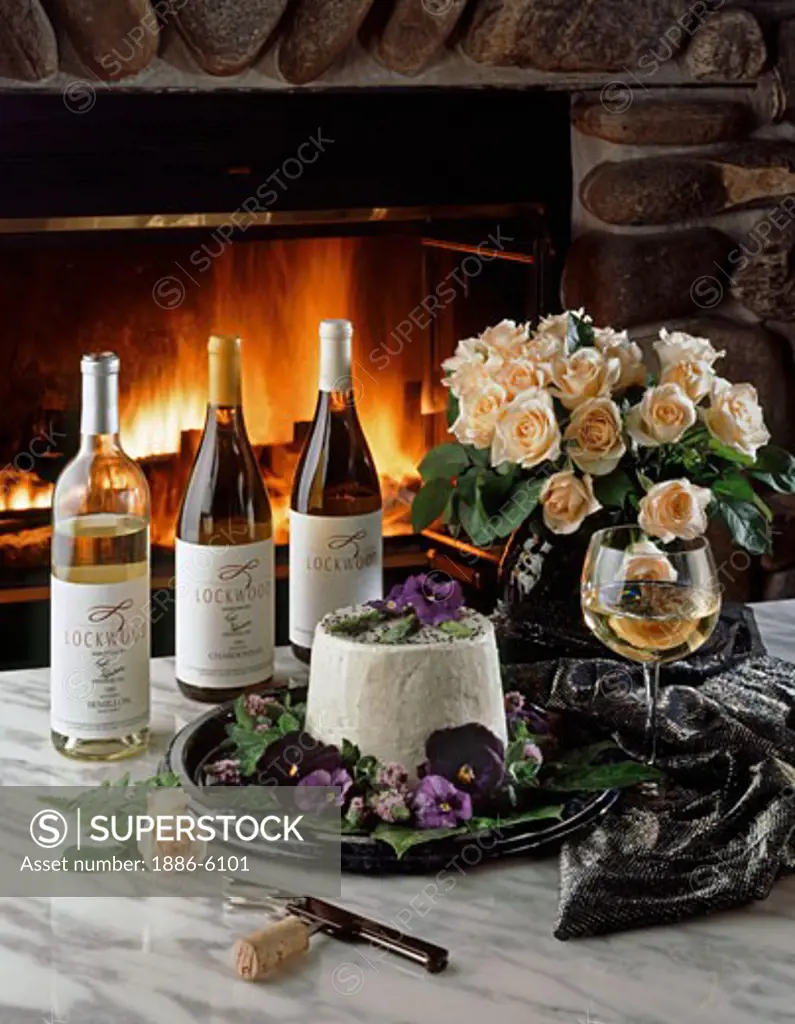 LOCKWOOD VINEYARD WINES with CHEESE and ROSES backlit by warm FIREPLACE 