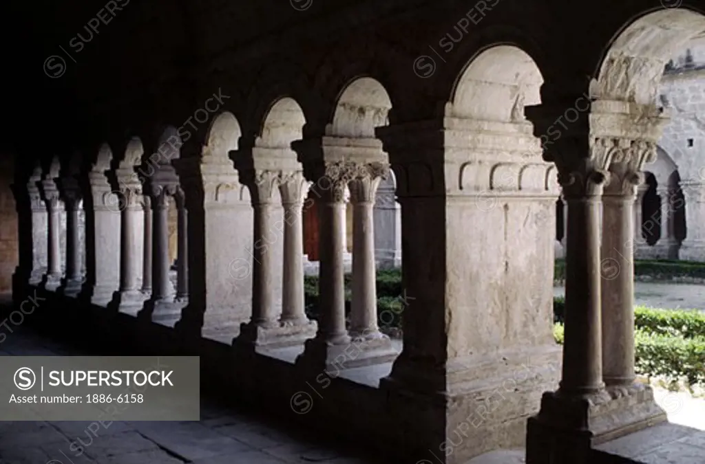 Columns & archways in the inner courtyard of The SENAQUE ABBEY (12th Cent. CISTERCIAN)  - PROVENCE, FRANCE
