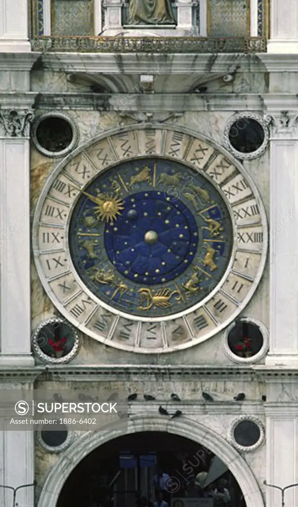 THE ASTROLOGICAL CLOCK is on a building in the main plaza of VENICE - ITALY