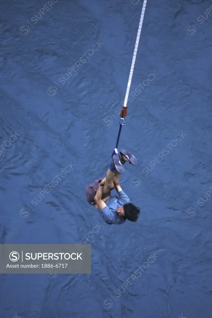 Richard Morris, a Kiwi guide, bungee jumps in Queenstown, New Zealand.  Queenstown, New Zealand