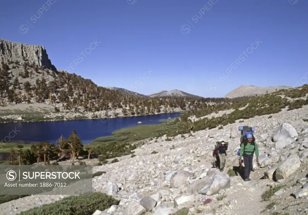 HIKERS ascend past COTTONWOOD LAKES  south of Whitney Portal on the hike into SEQUOIA NP, CA