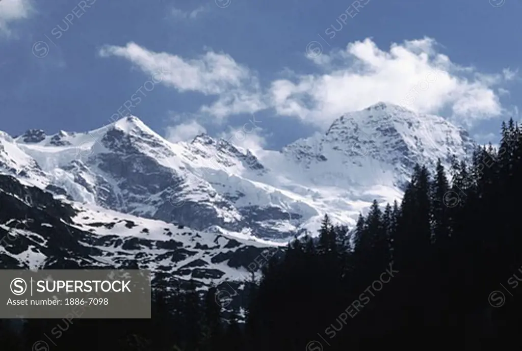 The glistening SWISS ALPS peak of JUNGFRAU - INTERLAKEN AREA OF SWITZERLAND
