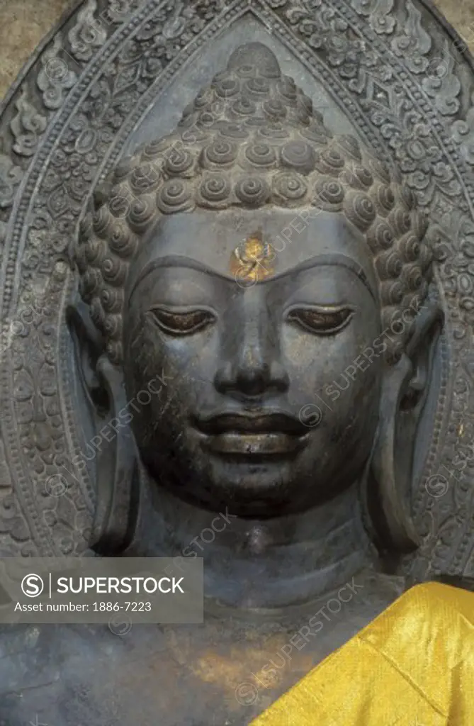 Green stone DAVARAVATI BUDDHA, a masterpiece of MON BUDDHIST ART at WAT NA PRAMAN  - AYUTTHAYA, THAILAND