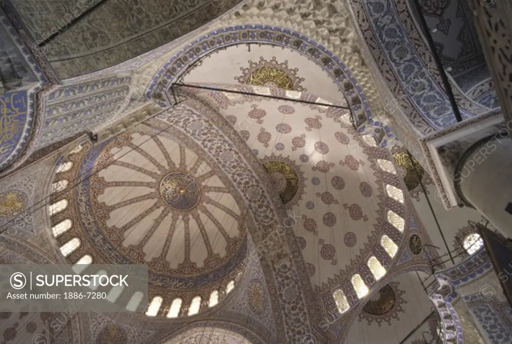 The beautifully painted interior domes of The Blue Mosque (Sultanahmet Camii) which was completed in 1616 - Istanbul, Turkey