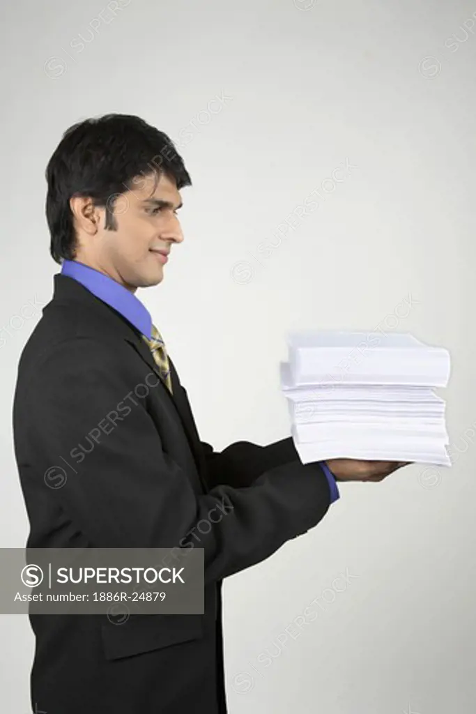 Executive holding bundle papers