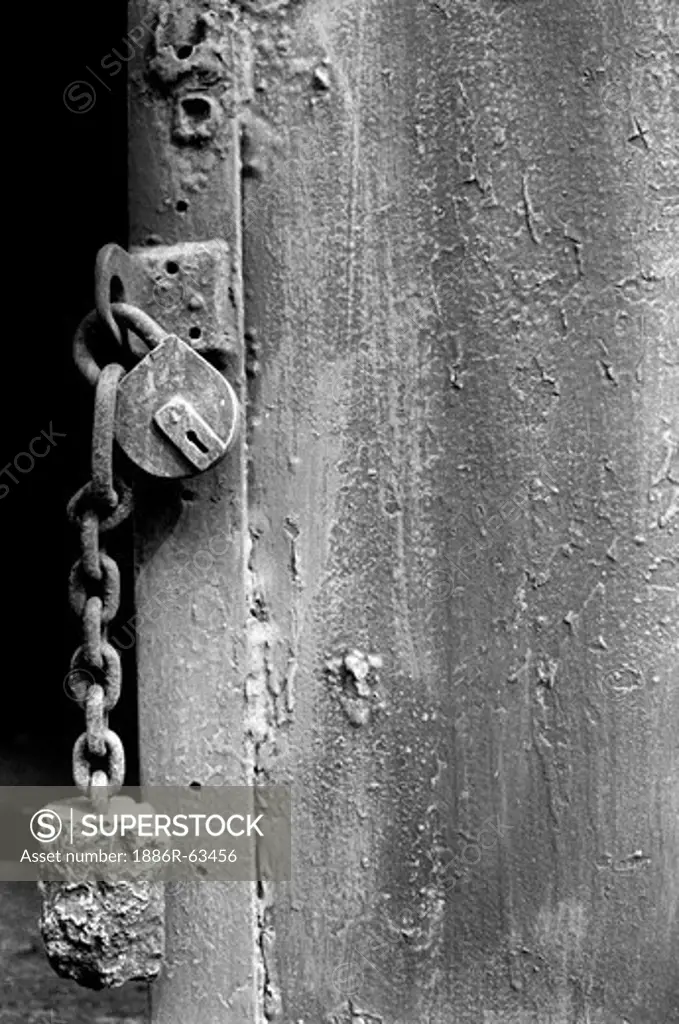 Close ups of very old door with old lock