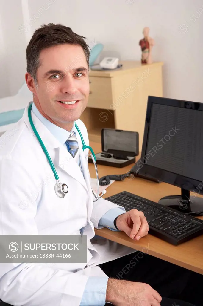 American doctor sitting at desk