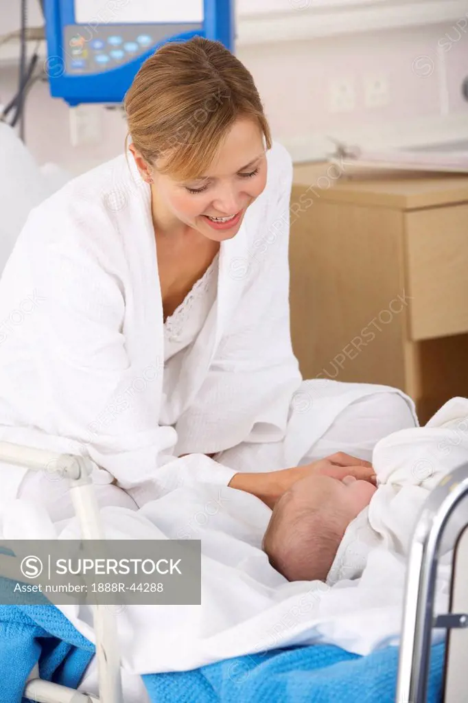 Mother in hospital with newborn baby