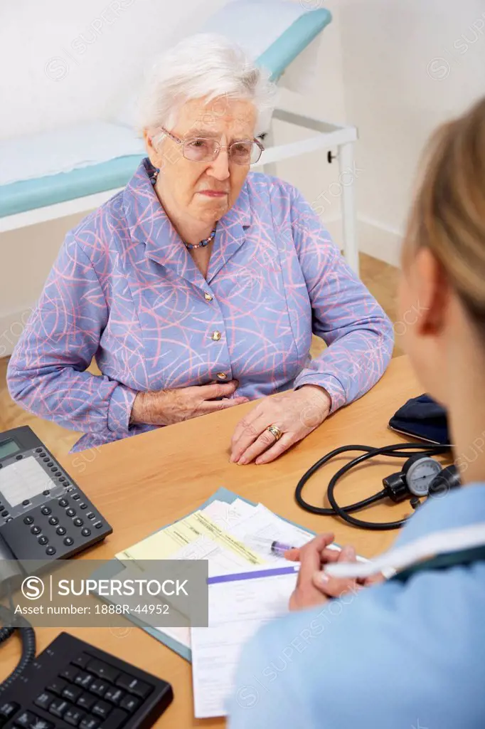 Senior woman patient with UK nurse