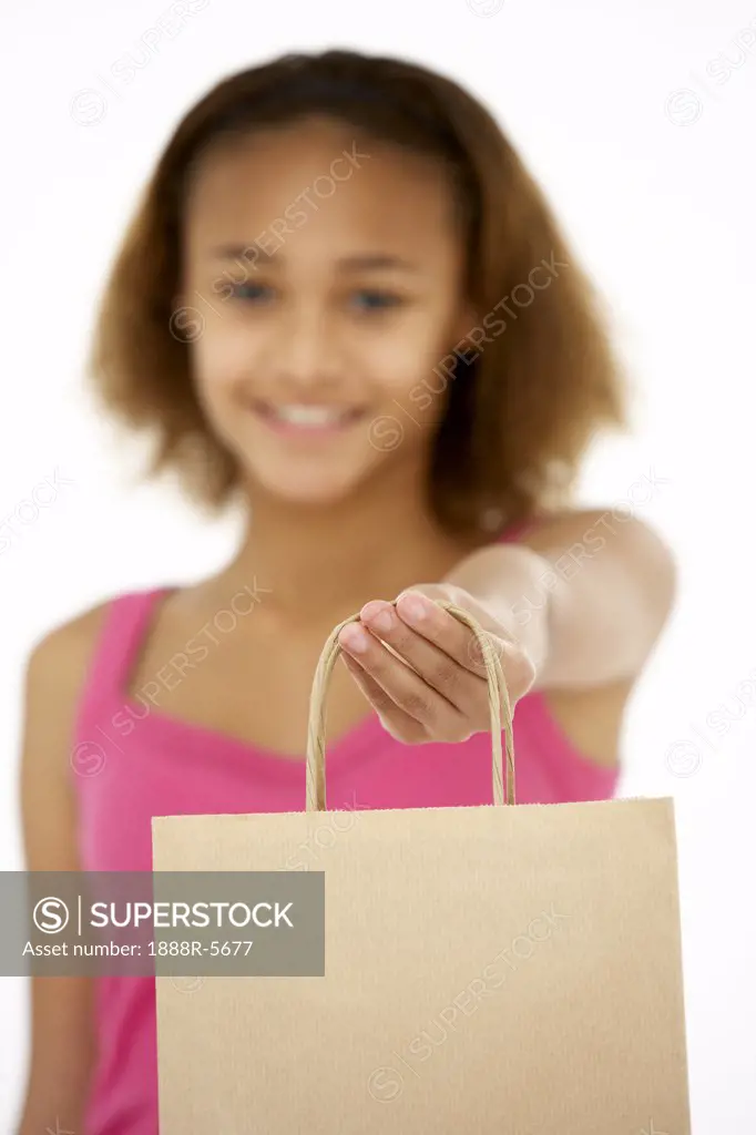 Young Girl Holding Shopping Bag