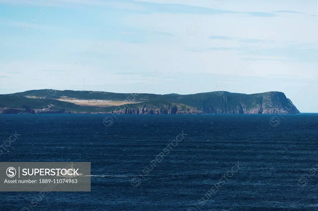 A boat on the water in Cape Spear; St. John's, Newfoundland and Labrador, Canada