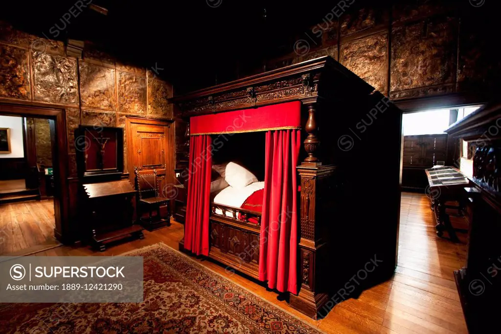 Carved oak four-poster bed in the bedroom of the Plantin-Moretus House-Workshops-Museum, Antwerp, Belgium