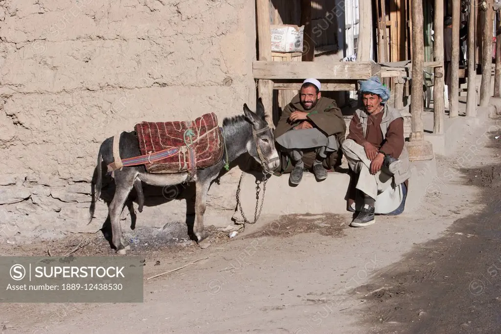 Afghan Men And Donkey In Kharwalang, Vardak Province, Afghanistan