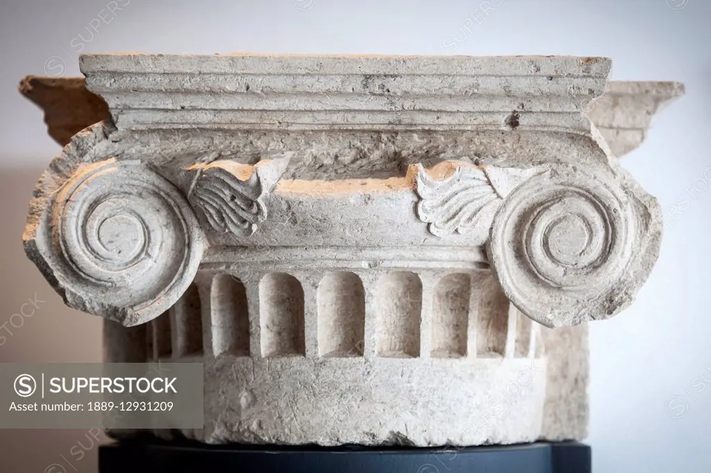 Close up of a stone pillar on display in an archaeological museum; Pella, Macedonia, Greece