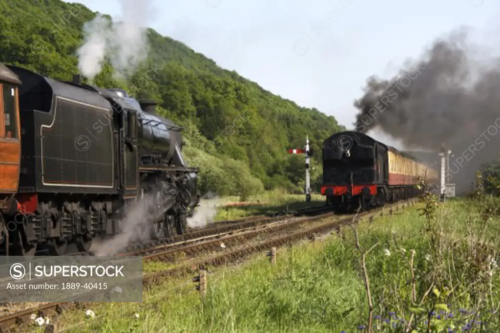 Trains in motion; Levisham, North Yorkshire, England, UK