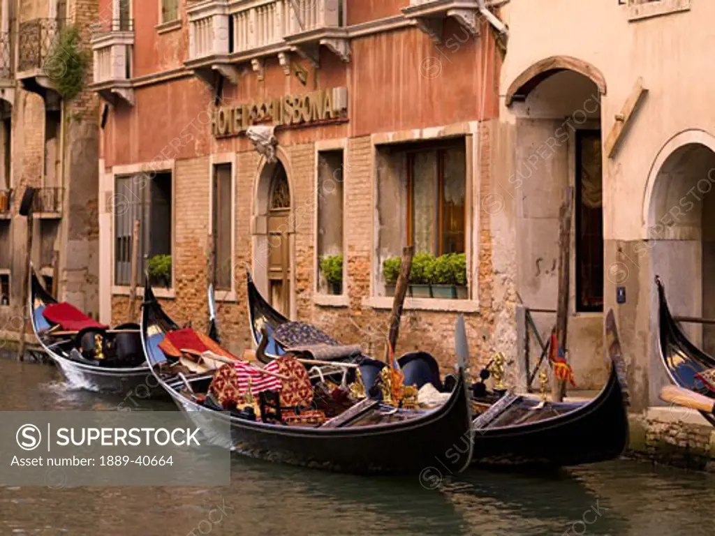Gondolas in front of hotel; Venice, Italy