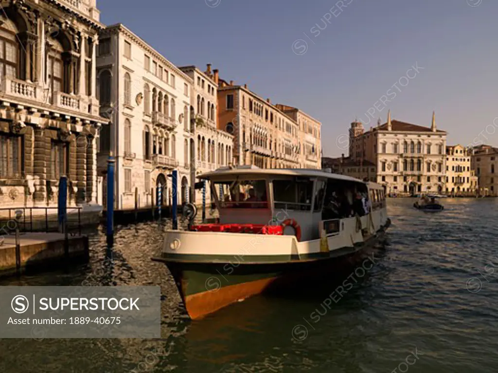 tourboat transporting tourists on canal; Grand Canal, Venice, Italy