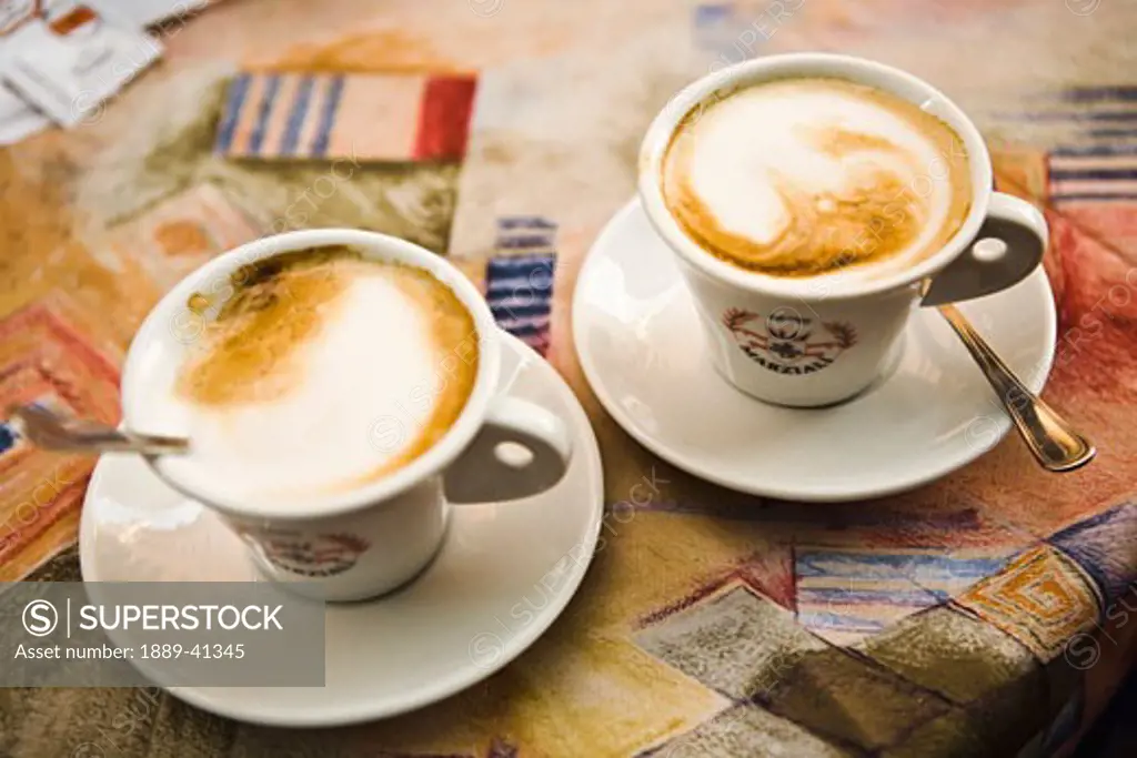 Two cappuccino cups; Rome, Italy