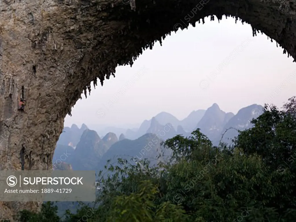 Natural arch in mountains; 