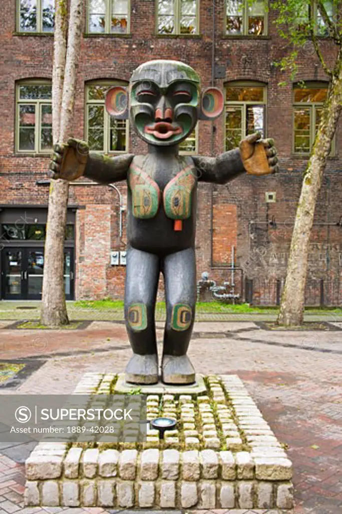 Wooden Statue in Pioneer Square; Seattle, Washington State, USA