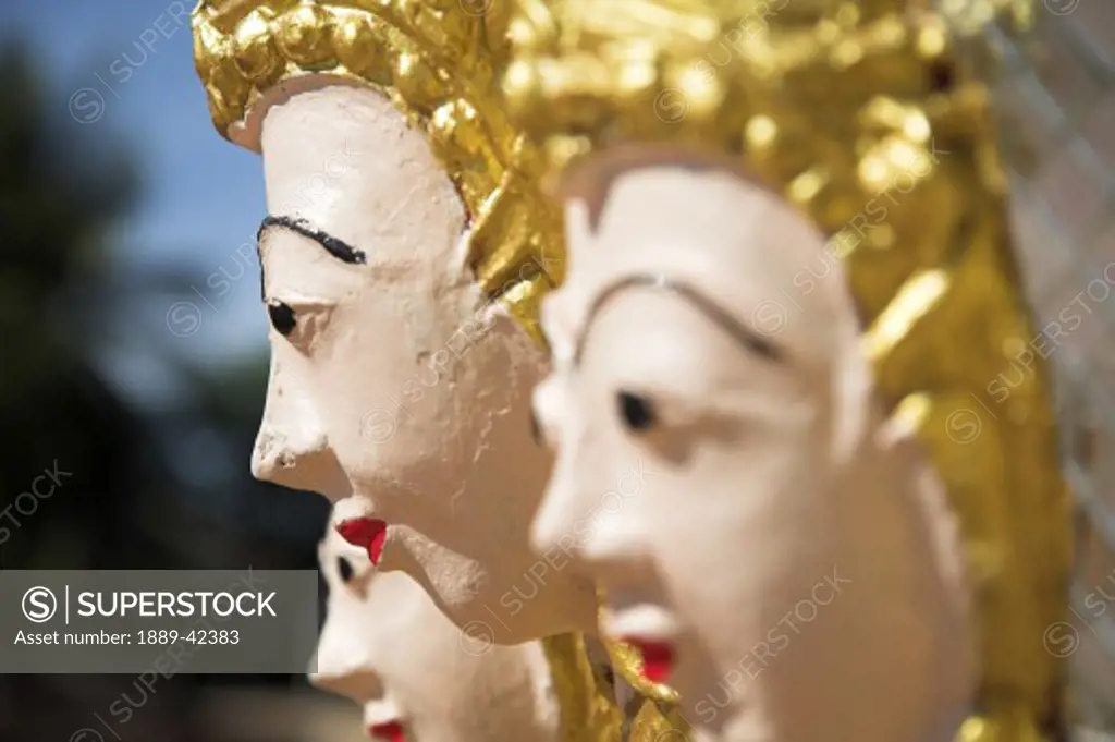 Khorat, Thailand; Close-up detail of sculpture on Southeast Asian temple