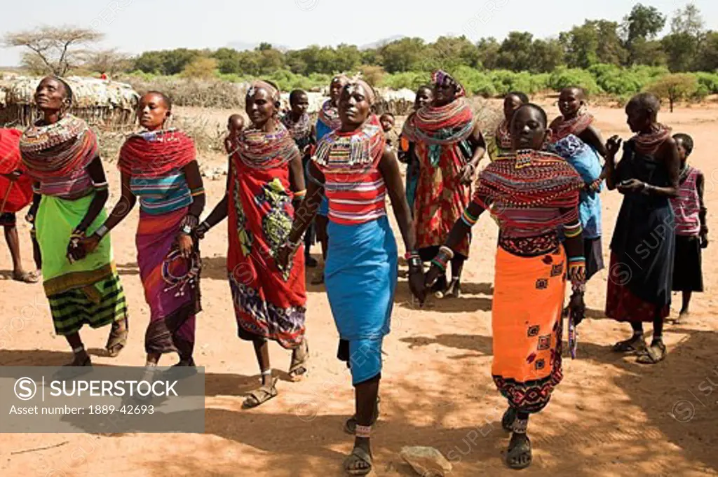 Kenya; Samburu women performing a welcome dance