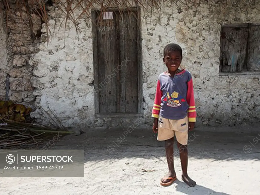 Zanzibar, Tanzania; Boy smiling at camera
