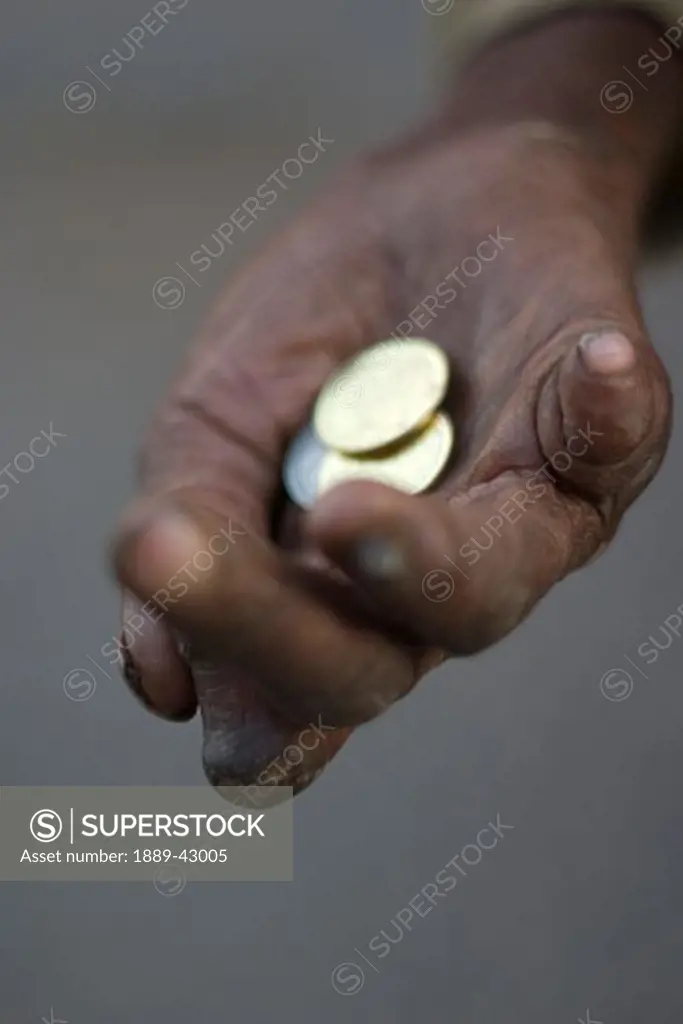 Harar, Ethiopia; Hand holding coins