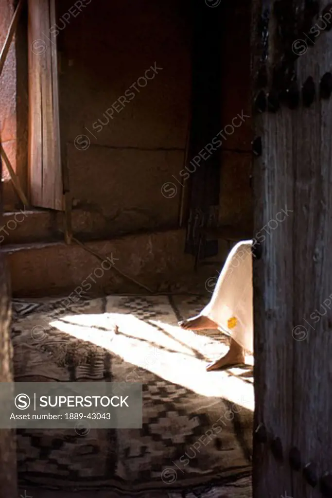 Lalibela, Ethiopia; Pilgrim inside St. George Church