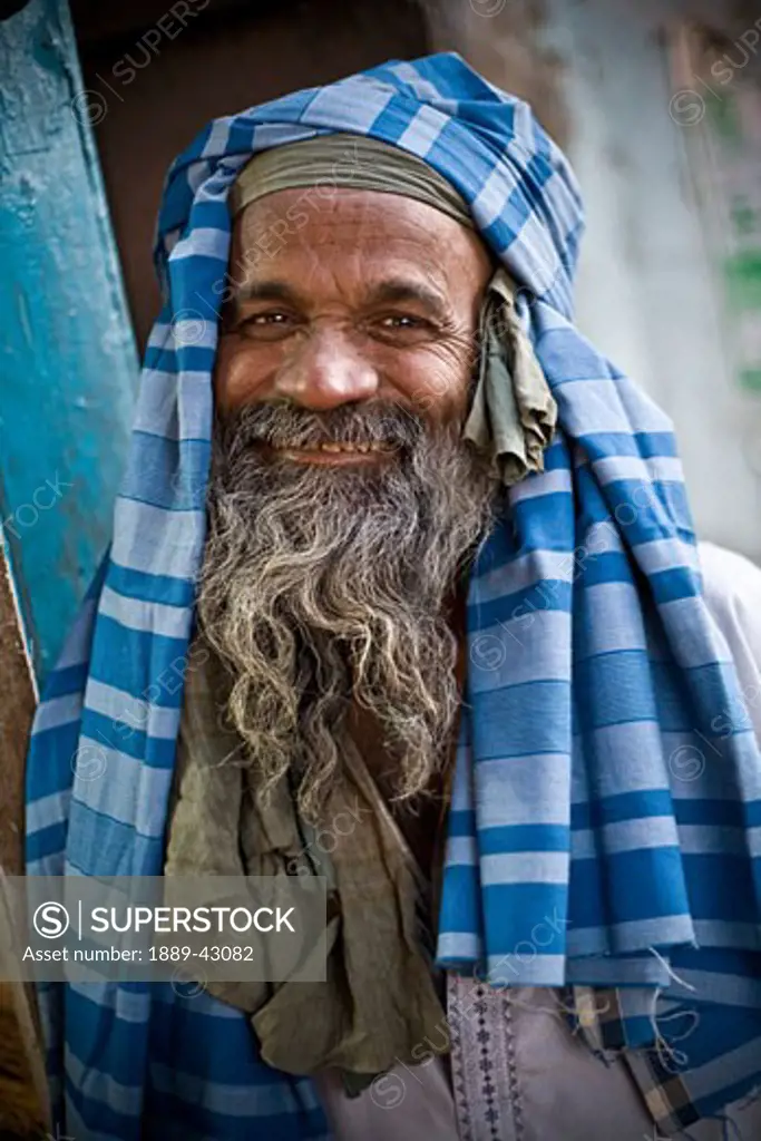 Delhi, India; Man smiling at the camera