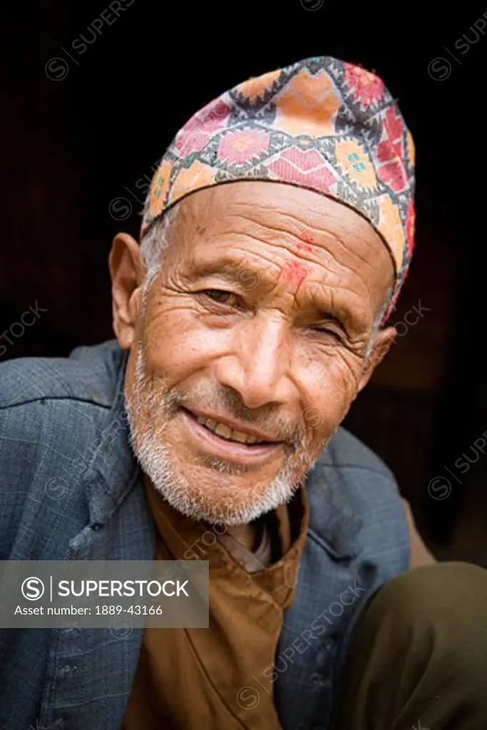 Bhaktapur, Nepal; Portrait of man smiling at camera