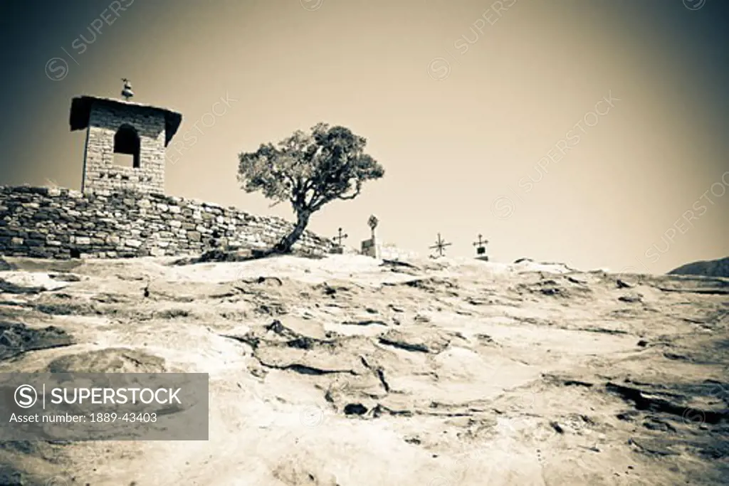 Ethiopia; Cemetery in desert with stone wall