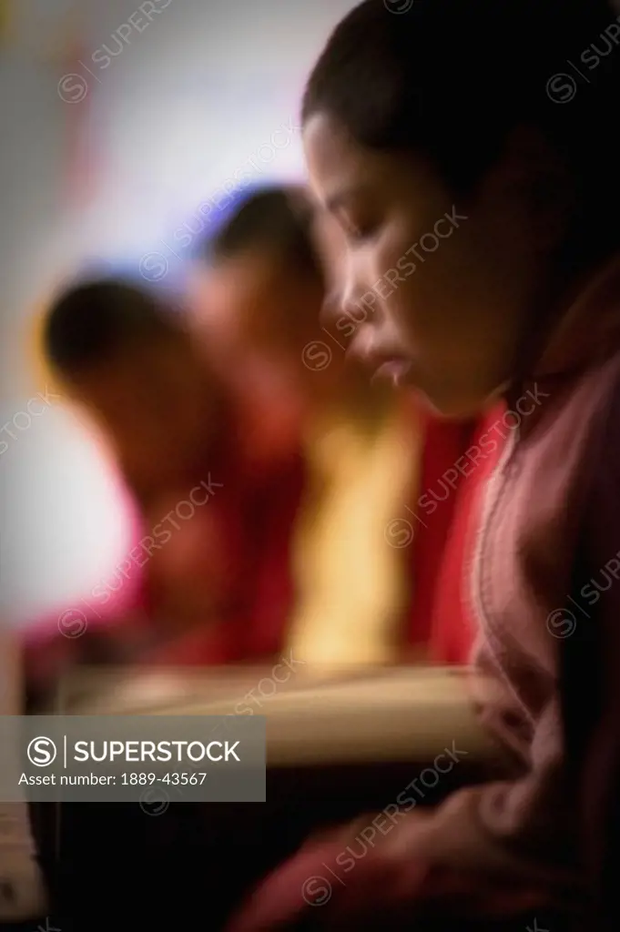 Lamayuru Monastery, Ladakh, Jammu and Kashmir, India; Young Buddhist scholars at their studies