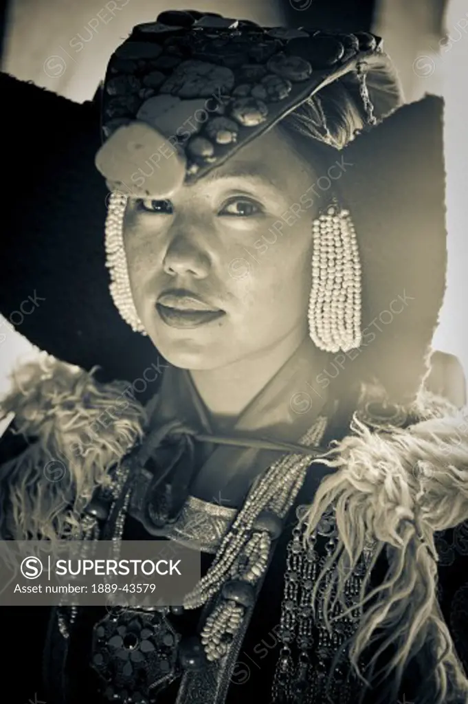 Leh, Ladakh, Kashmir, India; Woman dressed in traditional clothing