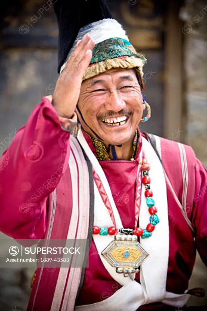 Leh, Ladakh, Kashmir, India; Man dressed in traditional clothing