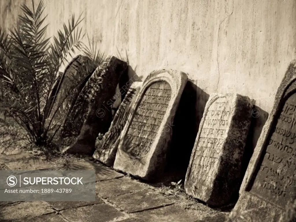 Jewtown,Cochin,Kerala,India;Gravestones leaning against a synagogue