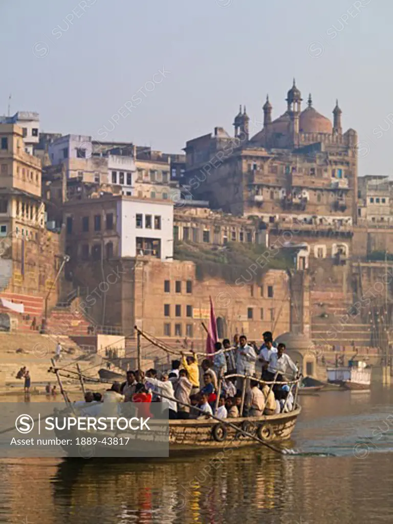 The Ganges,Varanasi,India;Boat full of people on the river