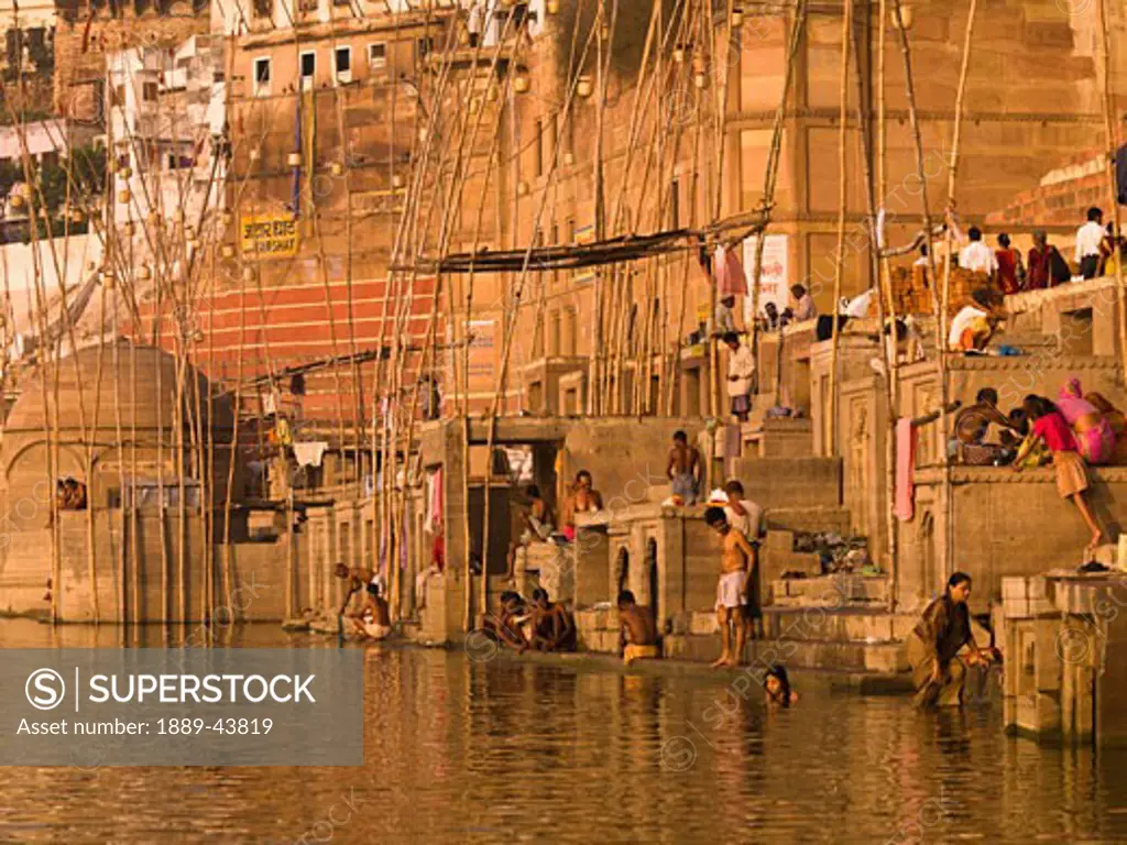 The Ganges,Varanasi,India;People bathing and relaxing in and around the river