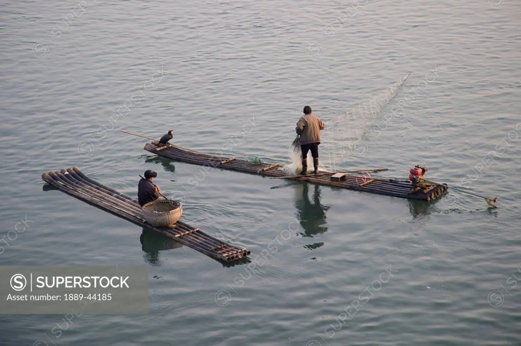 Men on a raft fishing